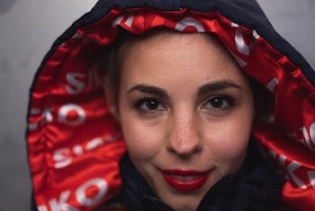 Woman in Black Hoodie Takes Selfie