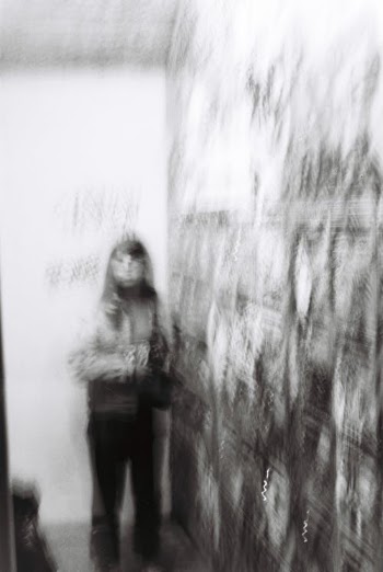 Woman in Black Jacket Standing Near Trees · Free Stock Photo