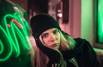 Woman in Black Jacket With Black Beanie Hat