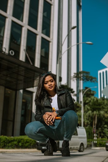 Woman In Black Leather Jacket