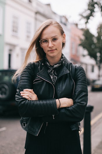 Woman in Black Leather Jacket Cross Arms