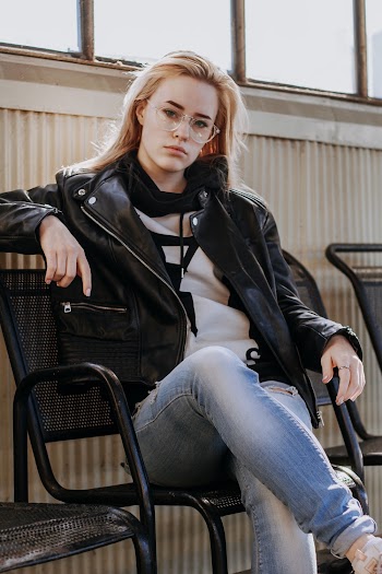 Woman In Black Leather Zip-up Jacket
