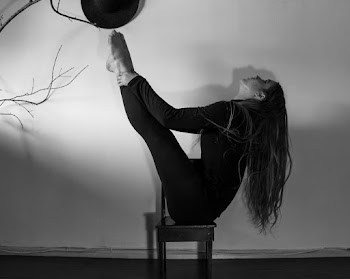 Woman in Black Long Sleeve Shirt and Black Pants