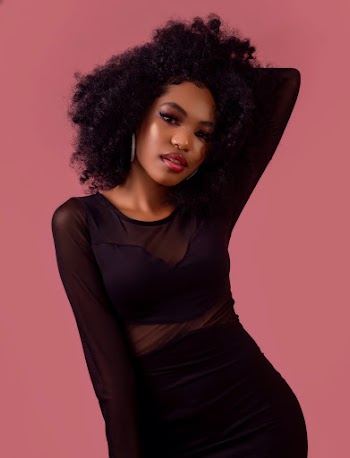 Woman In Black Long Sleeved Dress