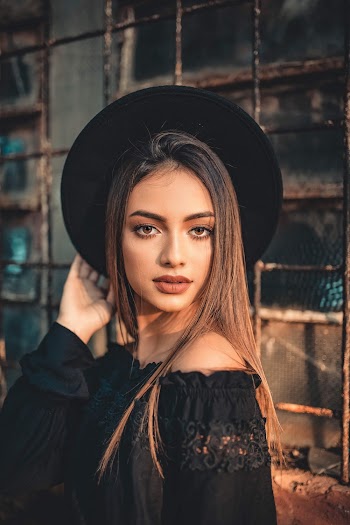 Woman In Black Off-shoulder Top