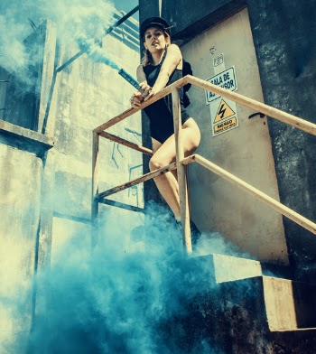 Woman in Black One Piece Swimsuit on Stairs