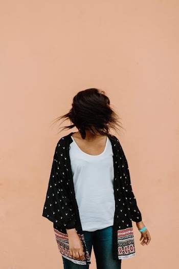woman in black open cardigan