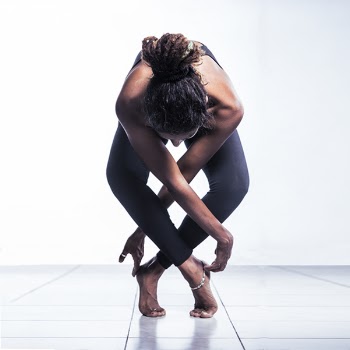 Woman in Black Pants Doing Yoga