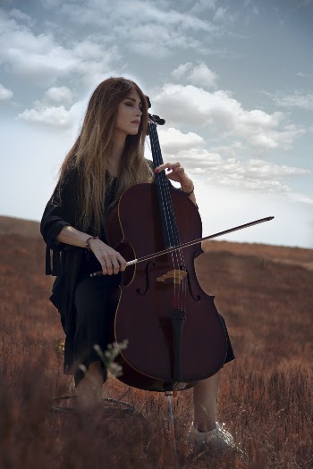 Woman in Black Playing Cello on Whitfield