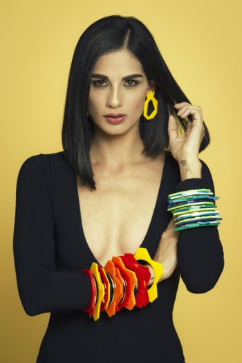 Woman in Black Plunging Neckline Top Holding Her Arm