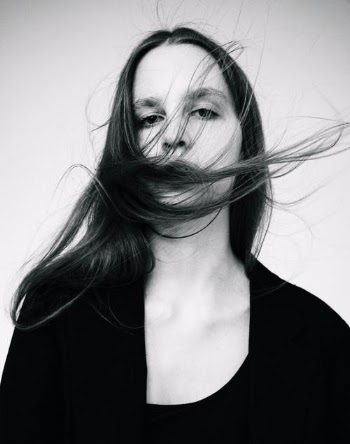 Woman in Black Scoop Neck Shirt · Free Stock Photo