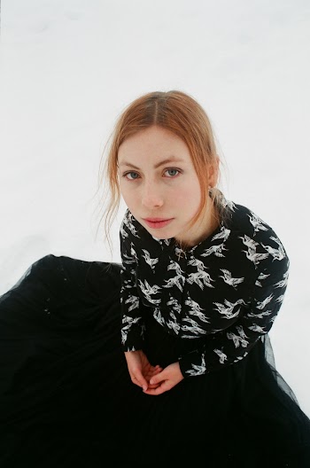 Woman in Black Shirt