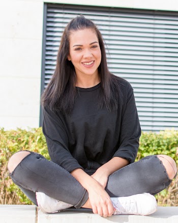 Woman in Black Shirt and Jeans