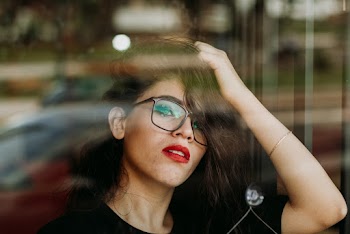 Woman in Black Shirt Posing