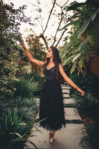 Woman In Black Sleeveless Dress