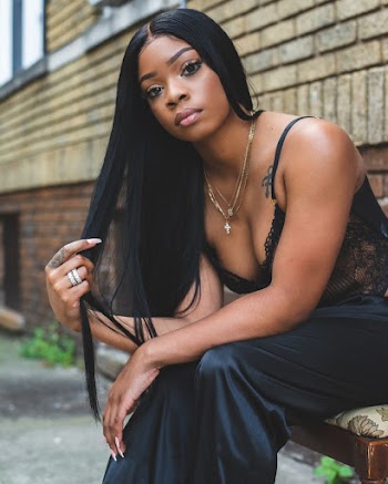 Woman In Black Sleeveless Top