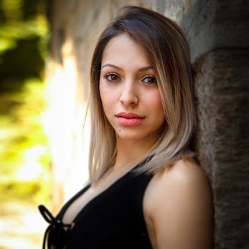 Woman in Black Sleeveless Top