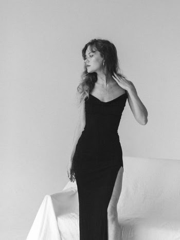 Woman in Black Spaghetti Strap Dress · Free Stock Photo