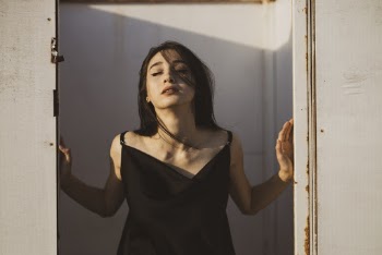 Woman in Black Spaghetti Strap Top