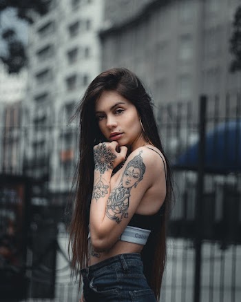 Woman In Black Sports Bra Standing Outside
