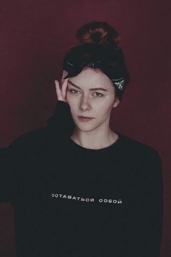Woman in Black Sweater