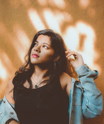 Woman in Black Tank Top and Blue Denim Jacket