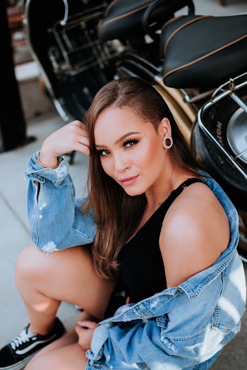 Woman In Black Tank Top And Blue Denim Jacket