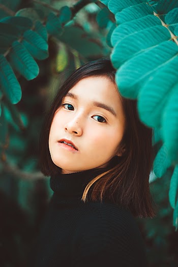 Woman in Black Turtleneck Top