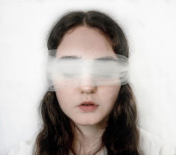 Woman In Blind Fold
