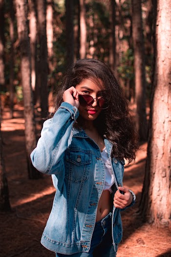 Woman in Blue Denim Button-up Jacket
