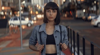 Woman in Blue Denim Button-up Top