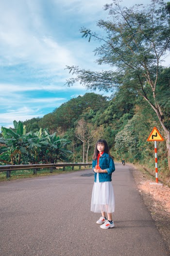 Woman In Blue Denim Jacket And White Skirt 