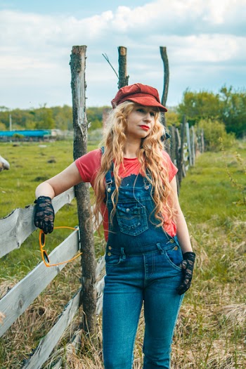 Woman In Blue Dungarees