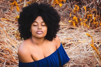Woman in Blue Off-shoulder Top