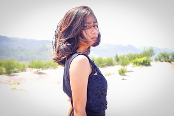 Woman in Blue Sleeveless Dress Standing on the Hill Dday