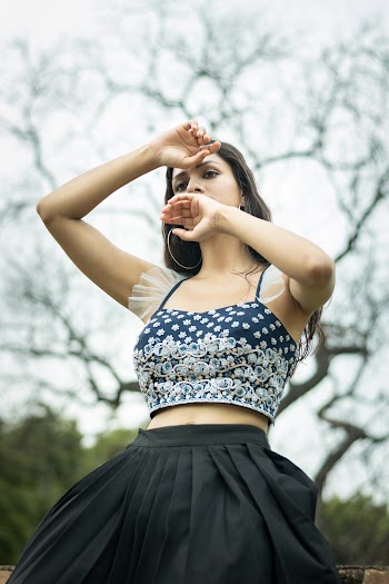 Woman in Blue Spaghetti-strap Crop Top