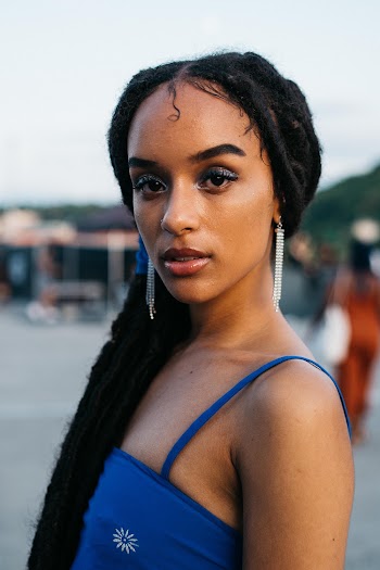 Woman in Blue Spaghetti Strap Top