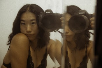 Woman In Brassiere Holding Canon Dslr Camera