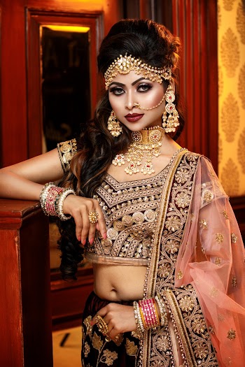 Woman in Brown and Black Floral Saree Dress