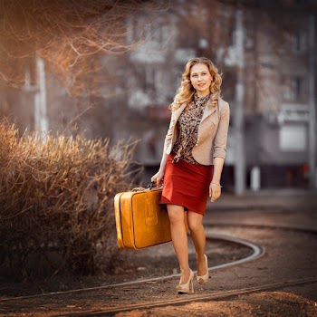Woman in Brown Blazer Holding Brown Briefcase