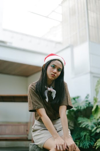 Woman in Brown Button Up Shirt and Red and White Cap · Free Stock Photo