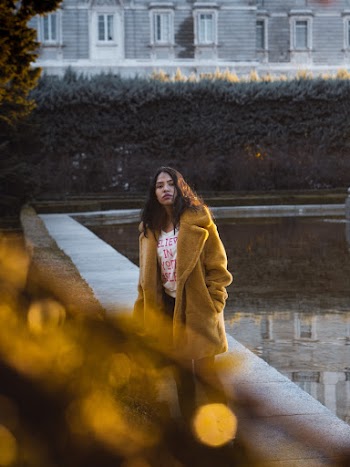 Woman in Brown Coat