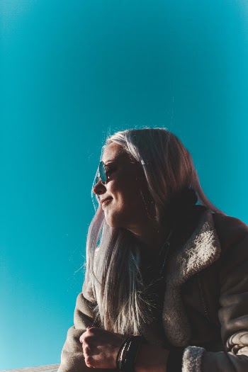 Woman In Brown Coat