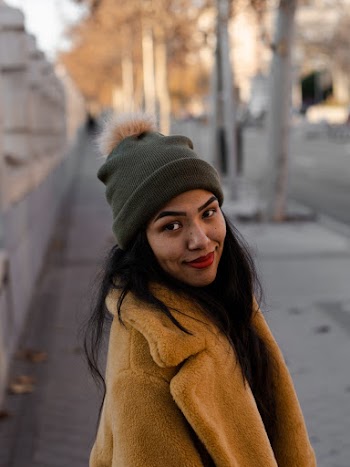 Woman in Brown Coat