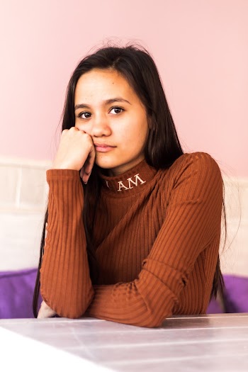Woman in Brown Long Sleeve Shirt