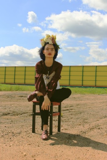 Woman in Brown Long Sleeves Sitting on a Stool · Free Stock Photo