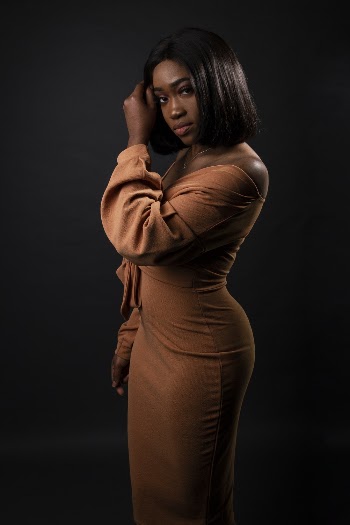 Woman In  Brown Off-shoulder Dress