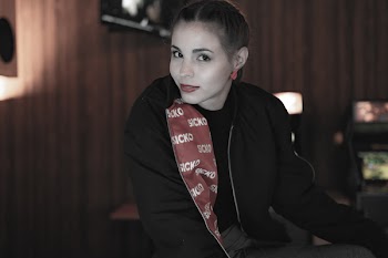 Woman in Brown Room