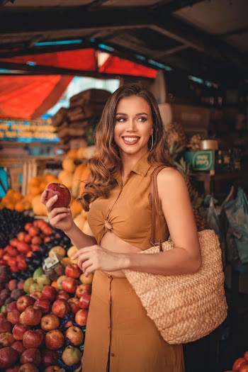 Woman In Brown Sleeveless Crop-top