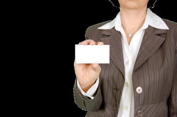 Woman in Brown Stripe Blazer Holding White Card